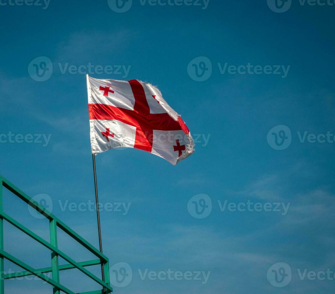 Flag of Georgia waving closeup photo