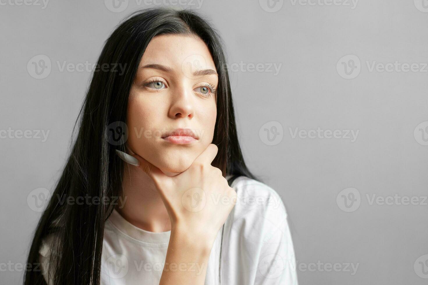 Portrait of a thoughtful young girl. photo