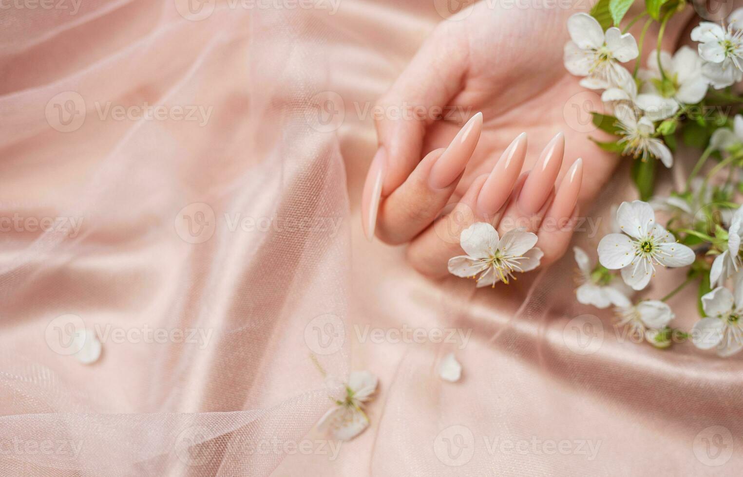 Elegant pastel pink natural manicure. photo