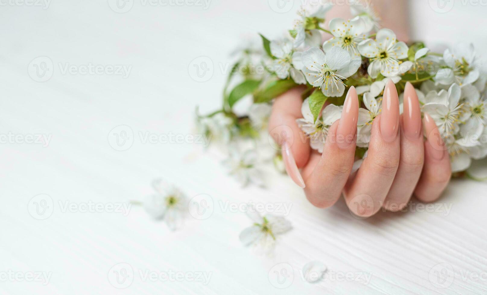 Elegant pastel pink natural manicure. photo