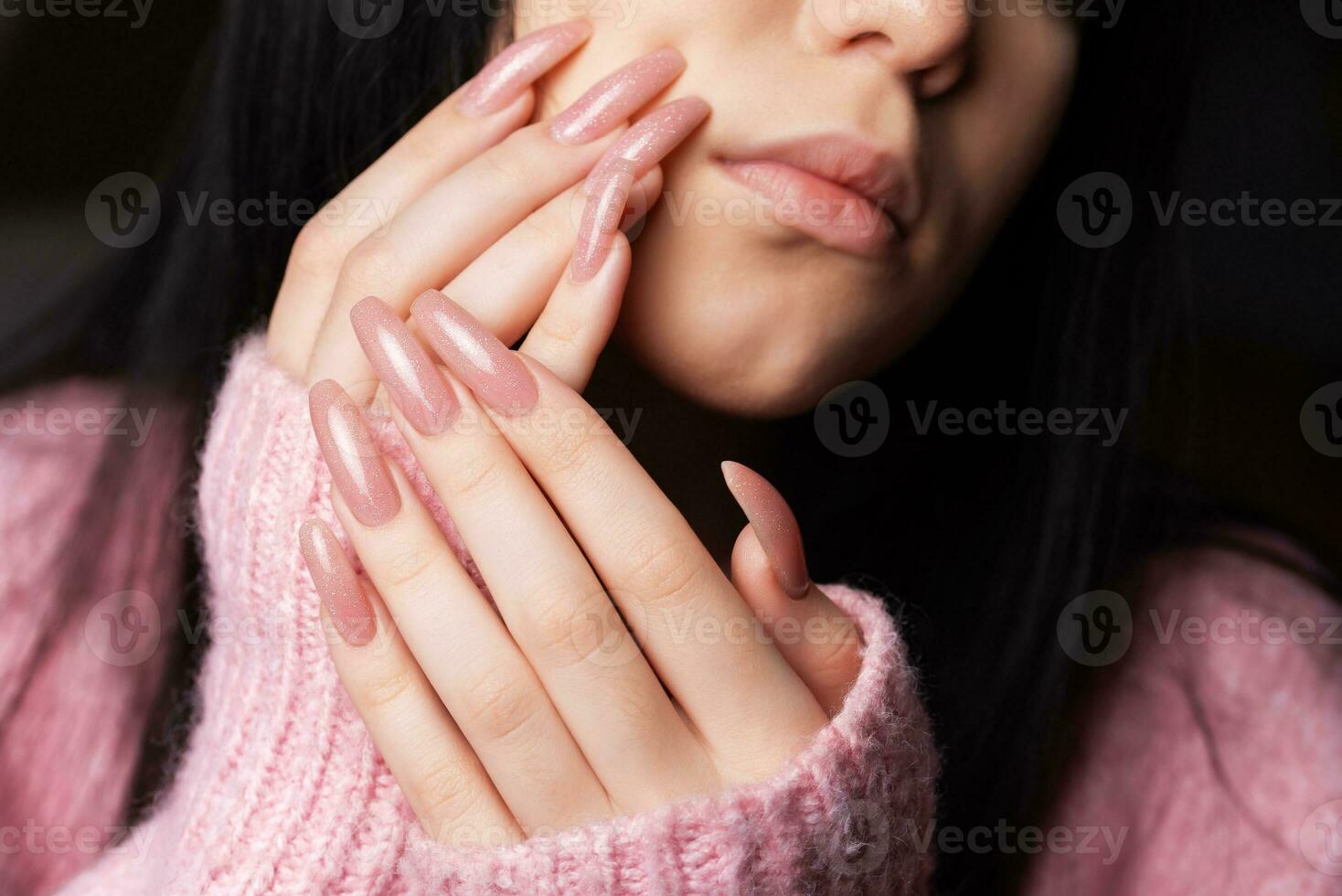 Beautiful Young Woman with manicure photo