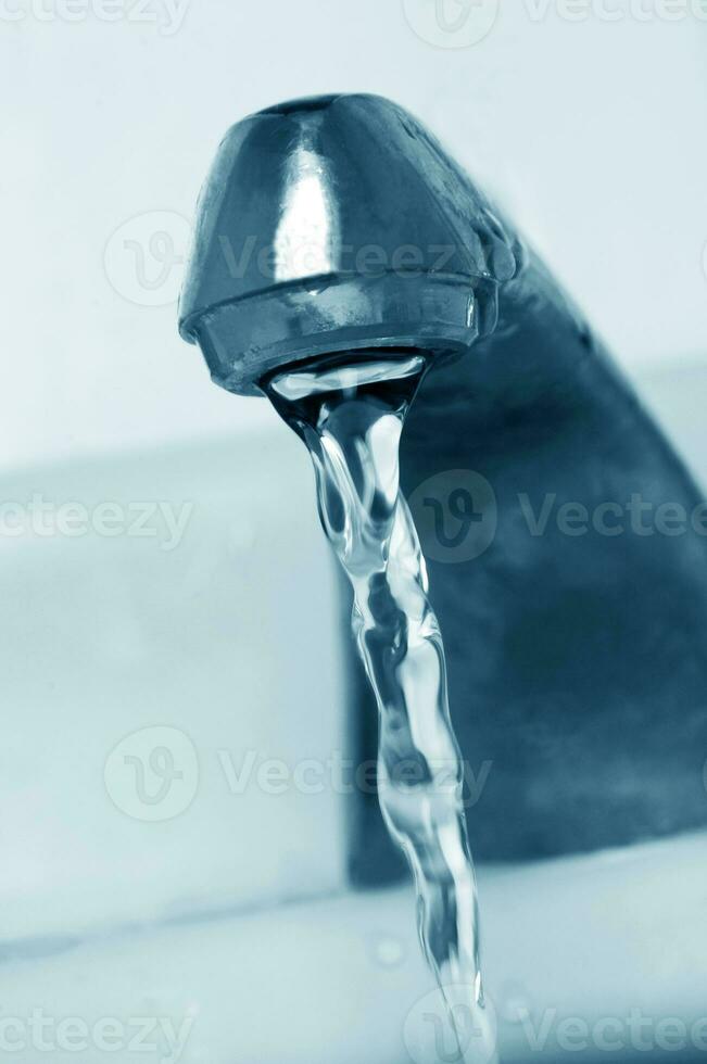 water tap closeup photo