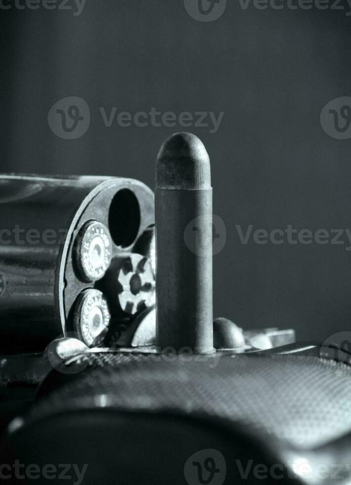 revolver and bullet photo