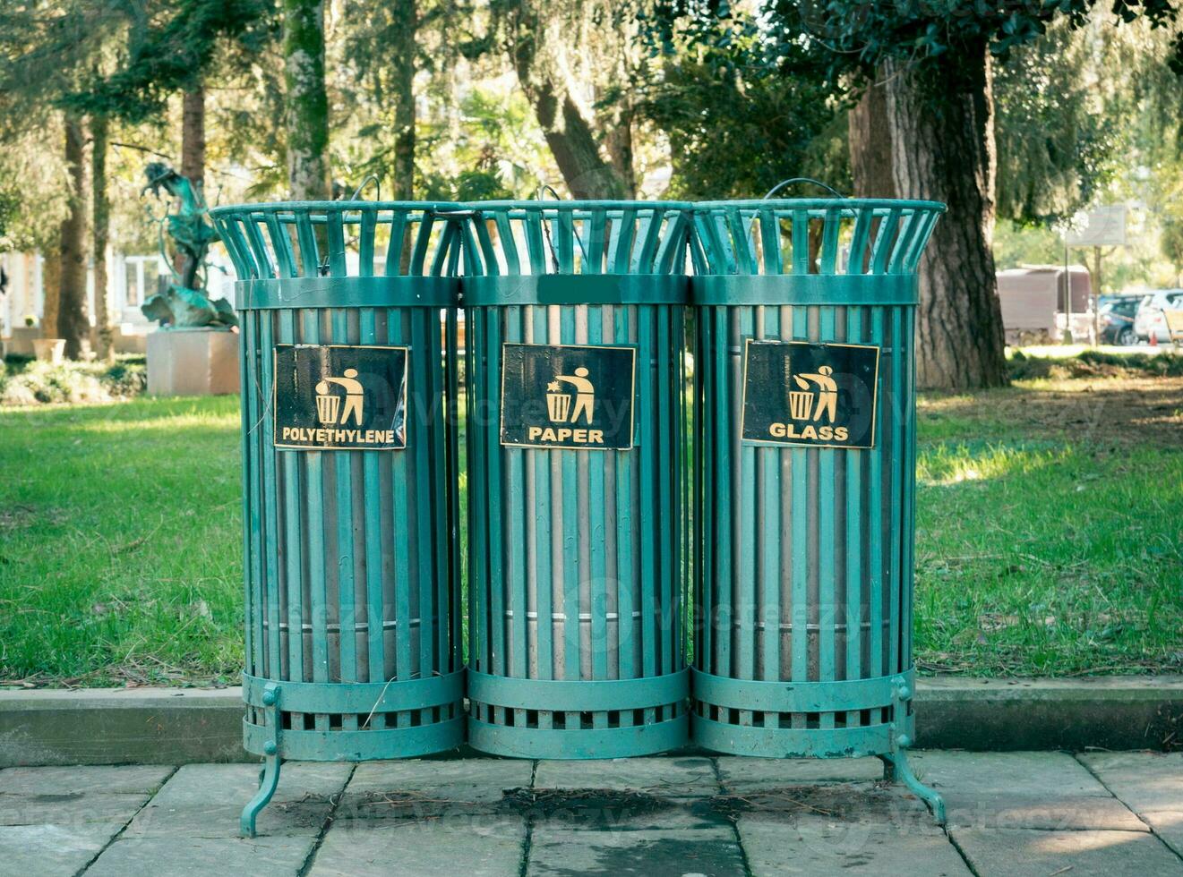 Garbage bins in the park photo