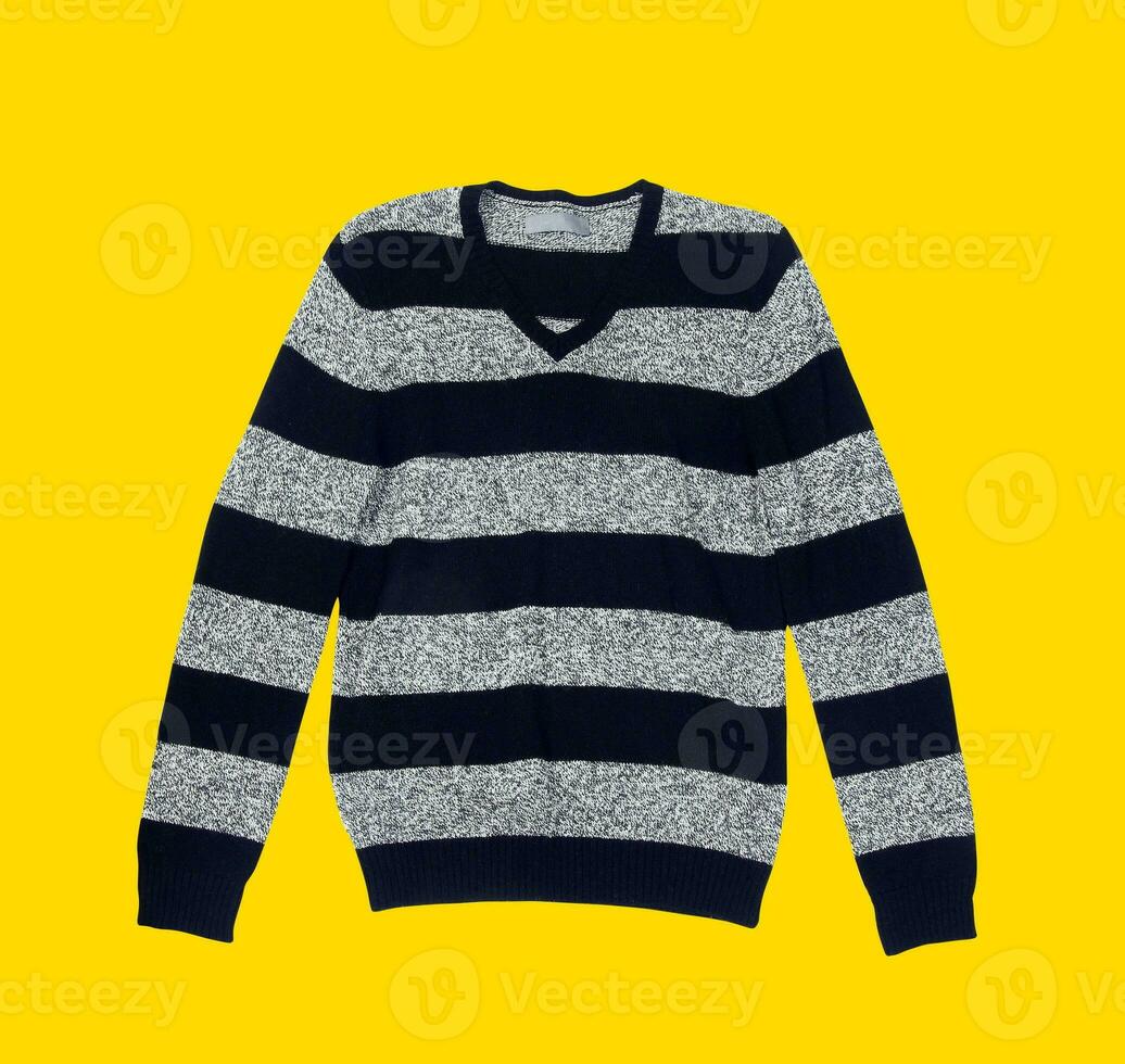 Casual sweater on yellow background photo