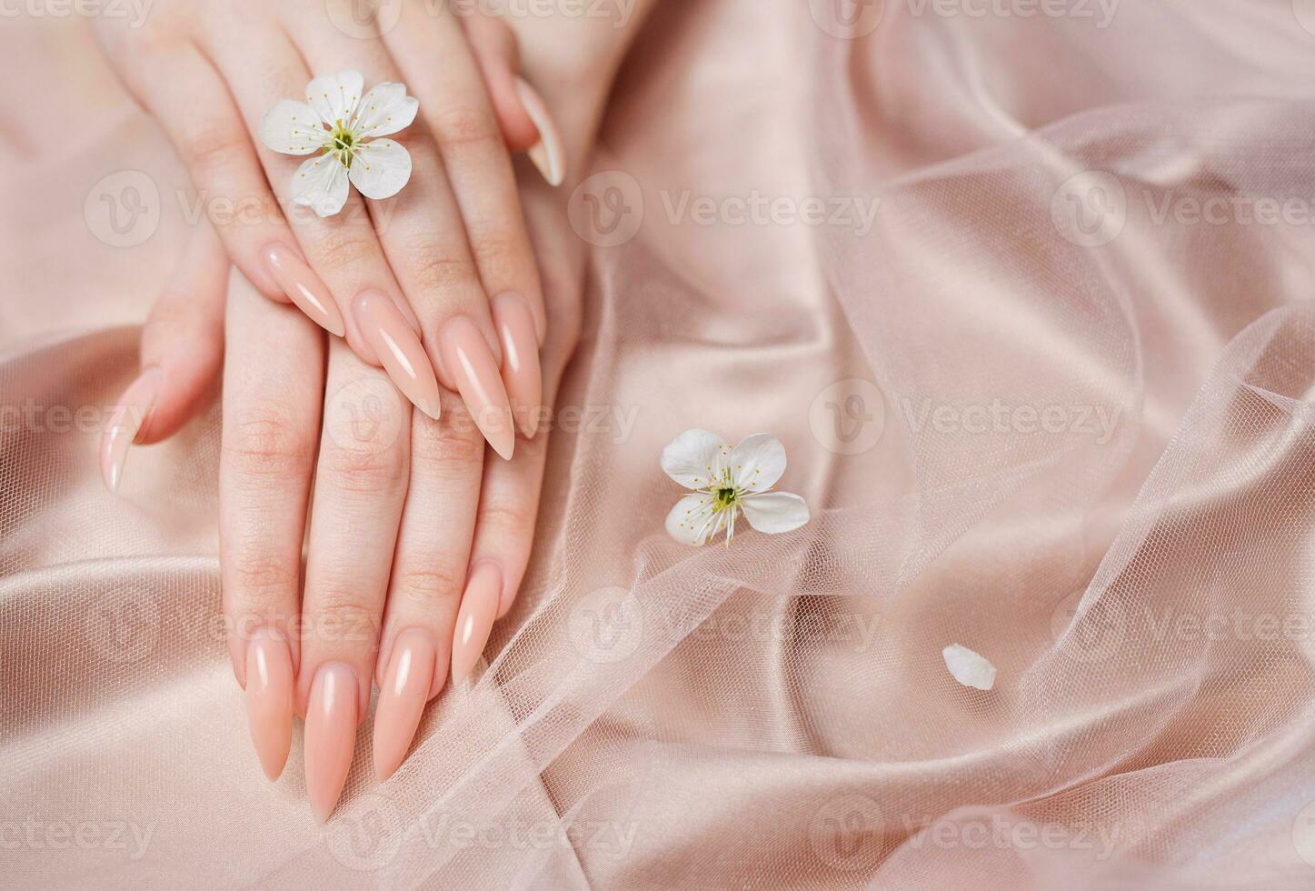 Elegant pastel pink natural manicure. photo
