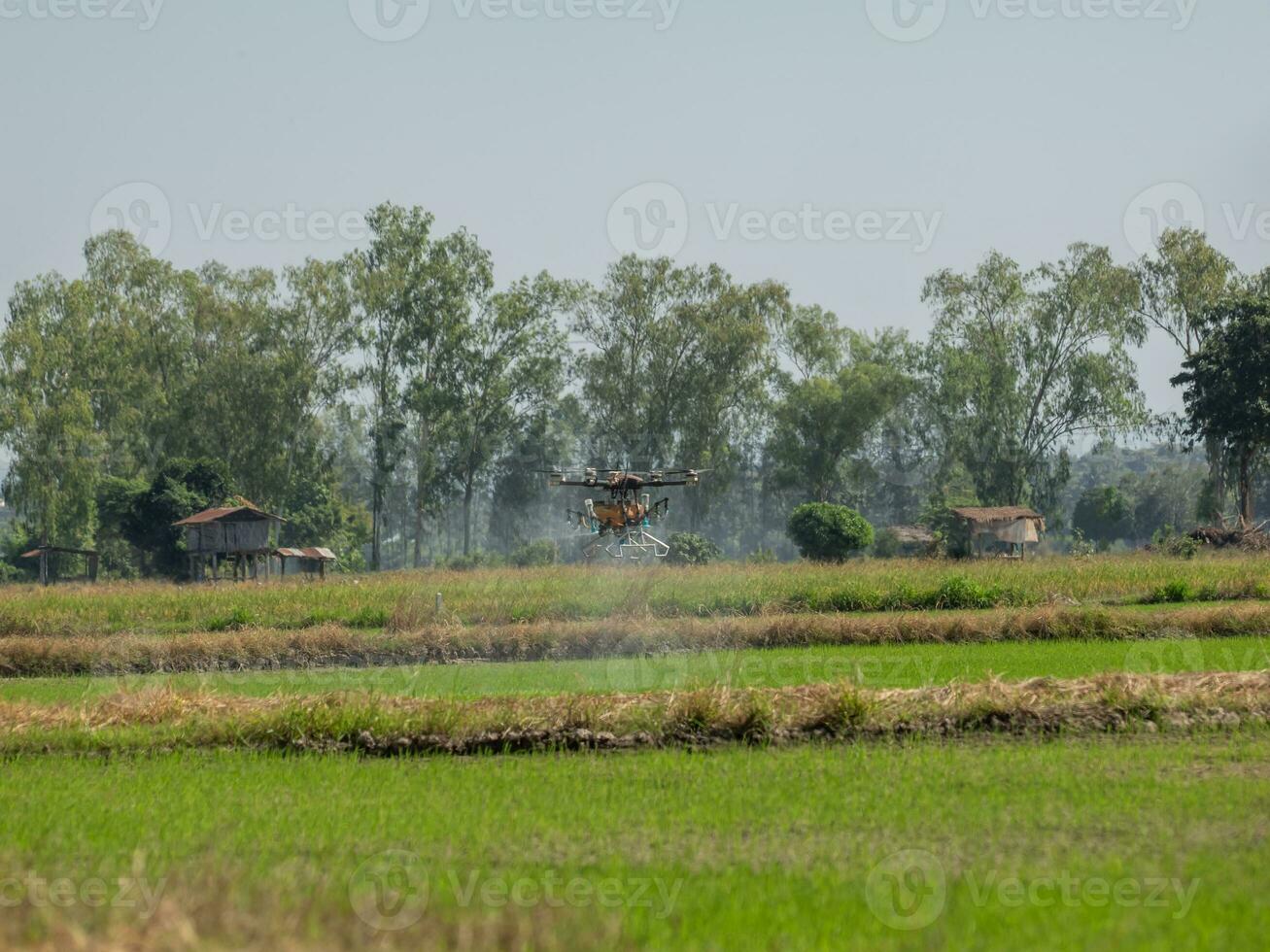 The drone can be controlled by mobile phone using GPS signals to control the direction of agricultural movement. photo