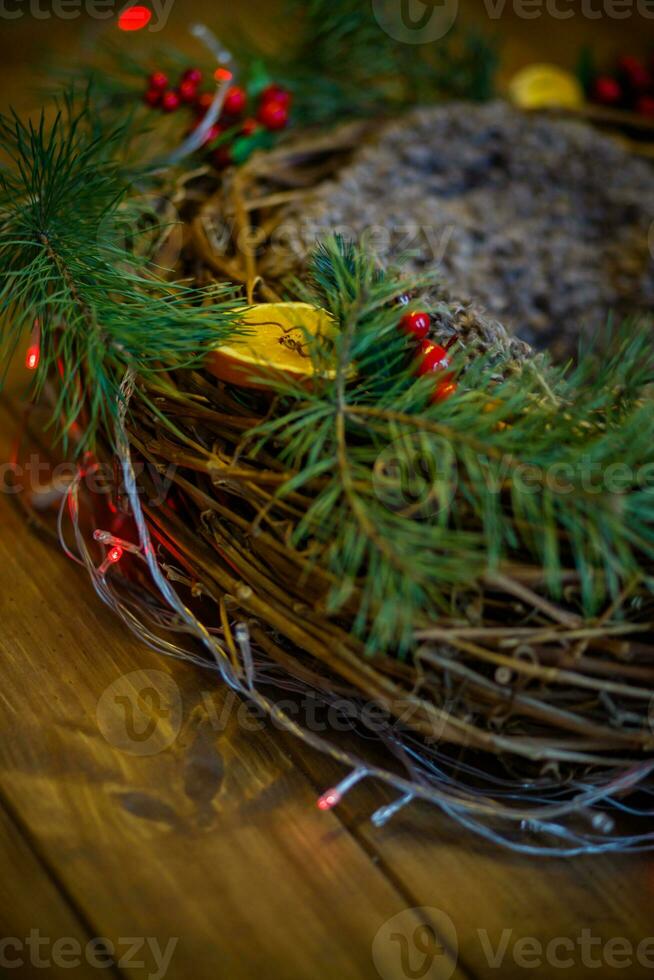 Christmas and New Year still life with Christmas tree branches, cookies and berries photo