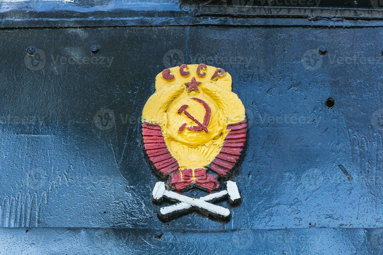 Text and numbers on a metal surface with the symbols of the USSR for design and commercial use photo