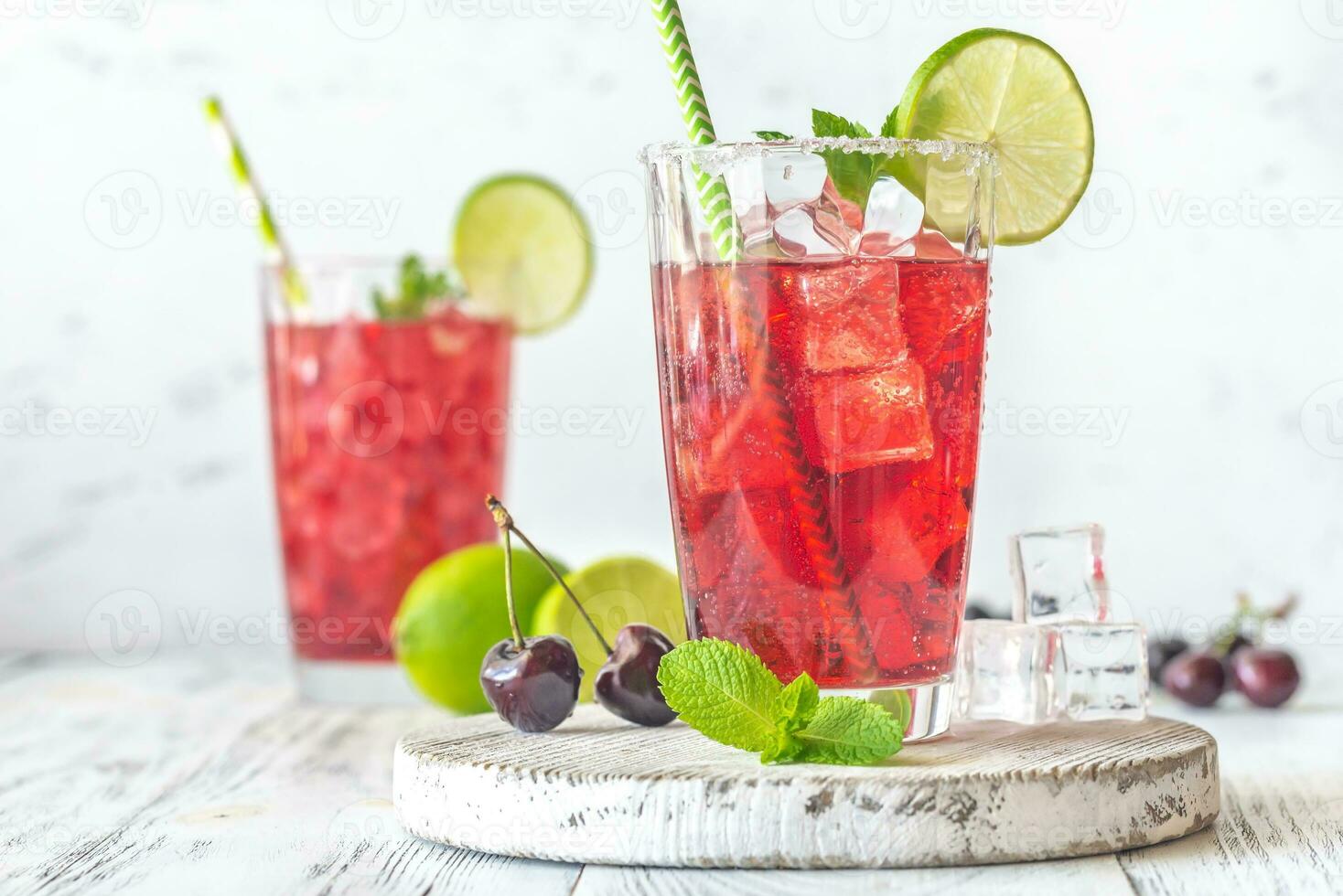 Two glasses of cherry mojito photo