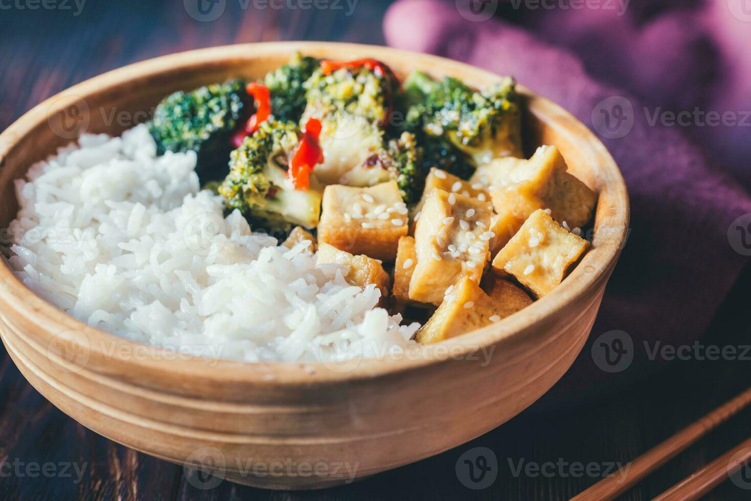 Tofu and broccoli stir-fry with white rice 36328723 Stock Photo at Vecteezy