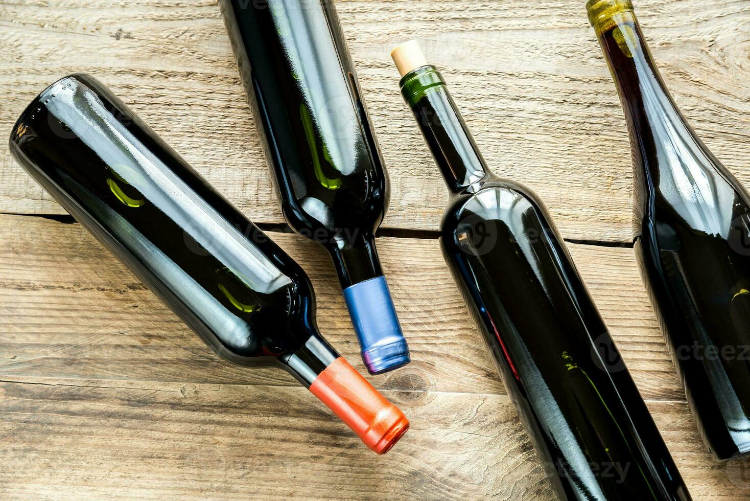 Bottles with red wine photo