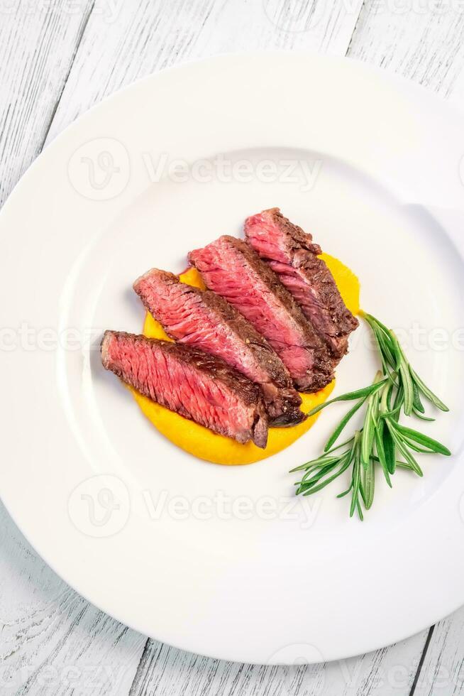 Sliced rib eye steak photo