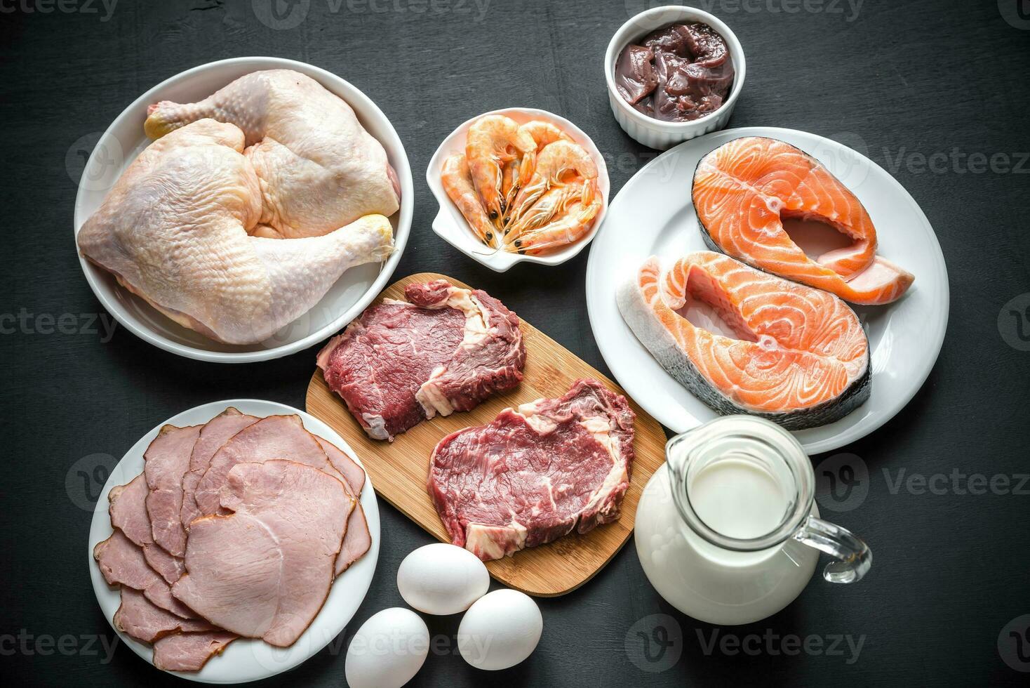 Protein diet raw products on the wooden background photo