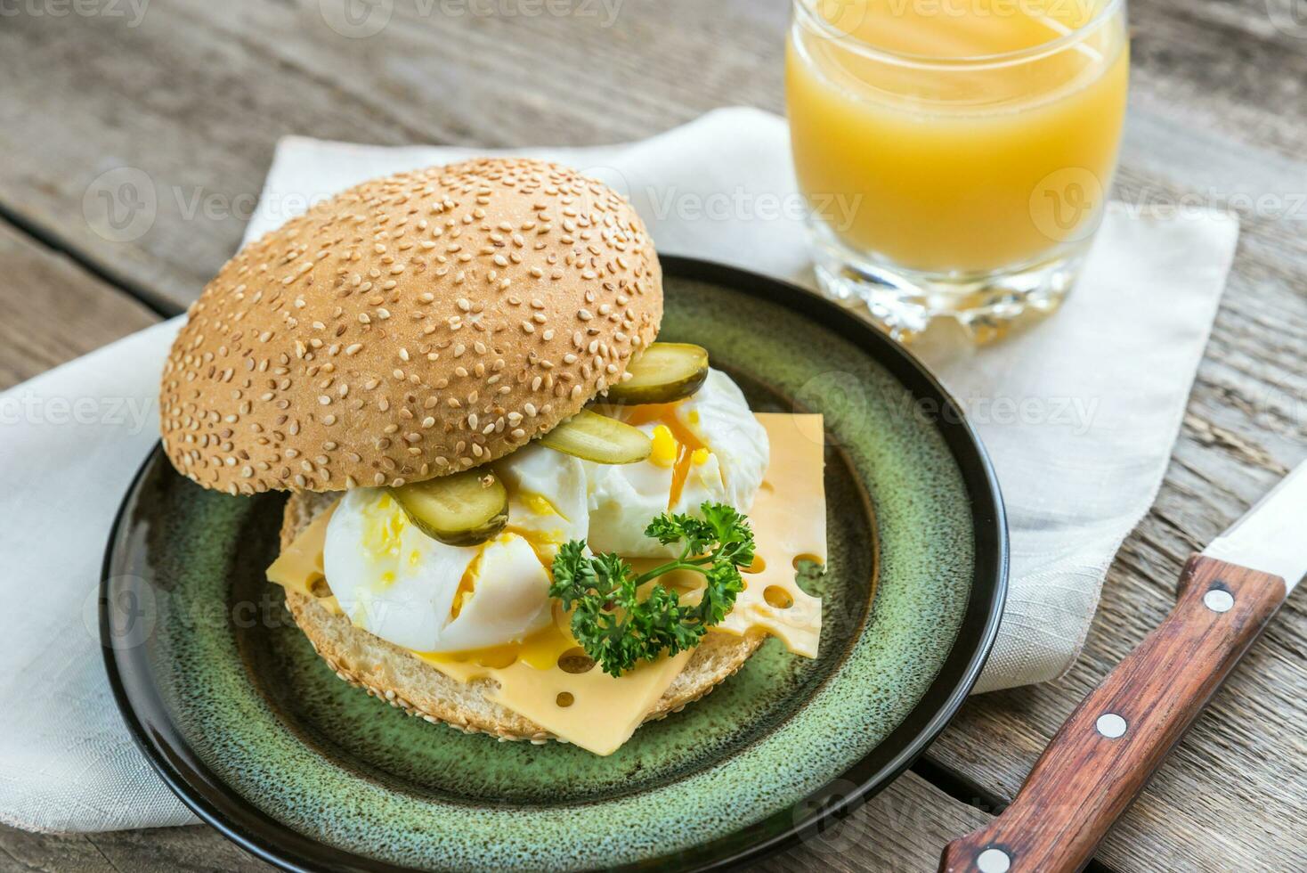 Sandwich with poached eggs photo