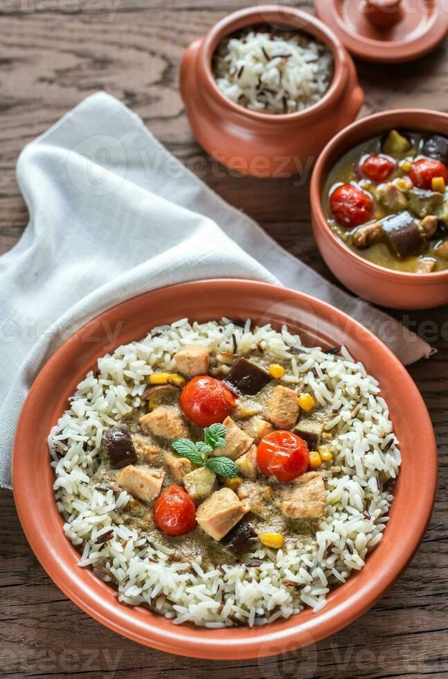 Thai green chicken curry with mix of white and wild rice photo