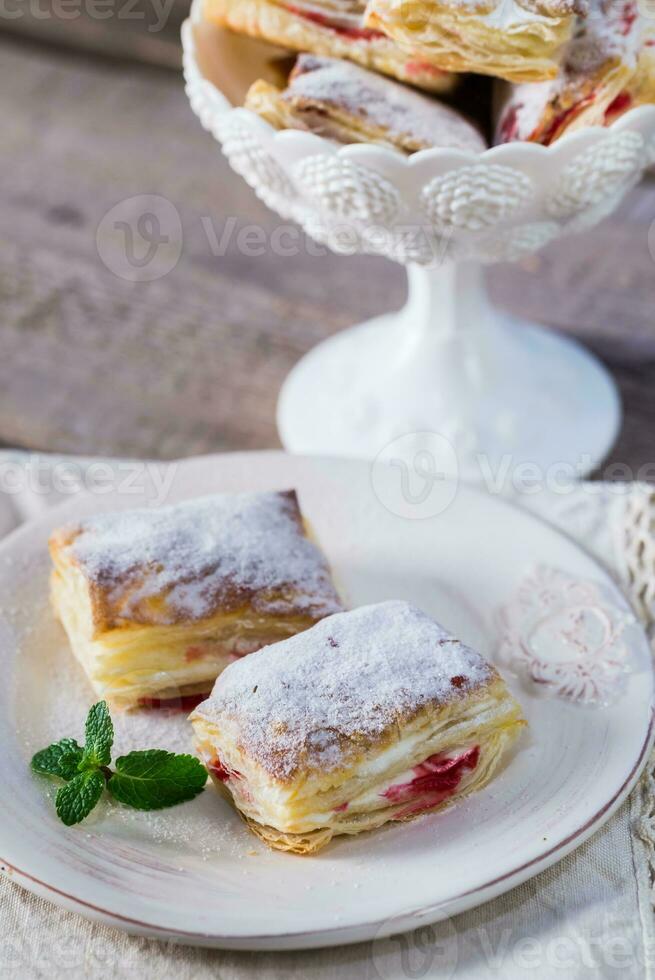 Mille-feuille with fresh cherry photo