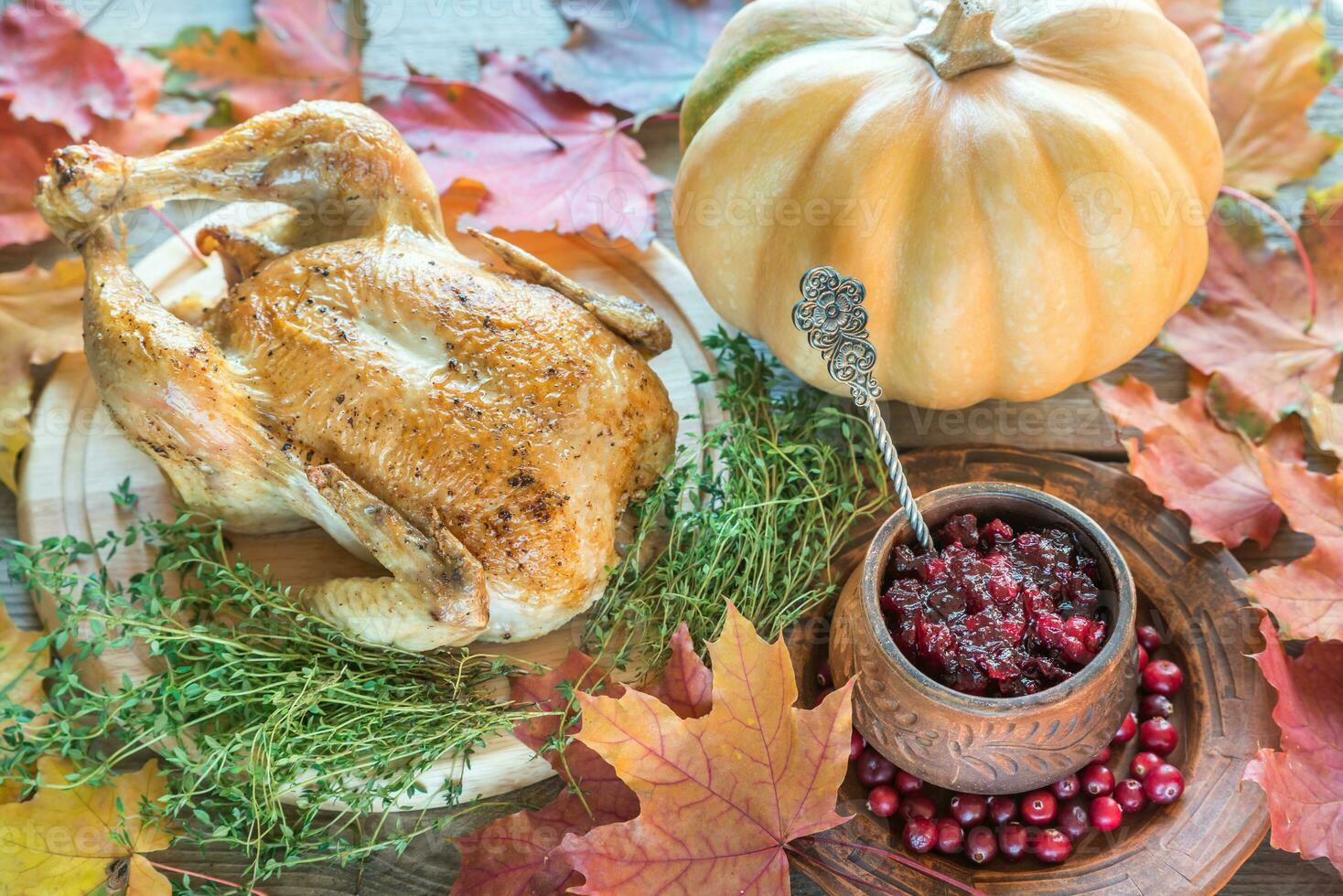 Roasted chicken with cranberry sauce photo