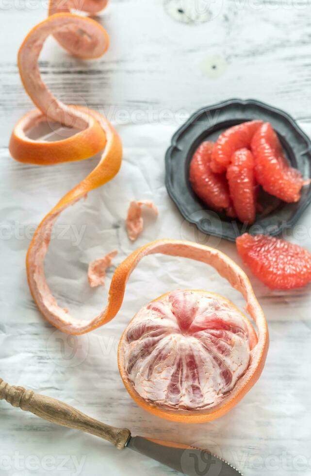 Peeled grapefruit closeup photo