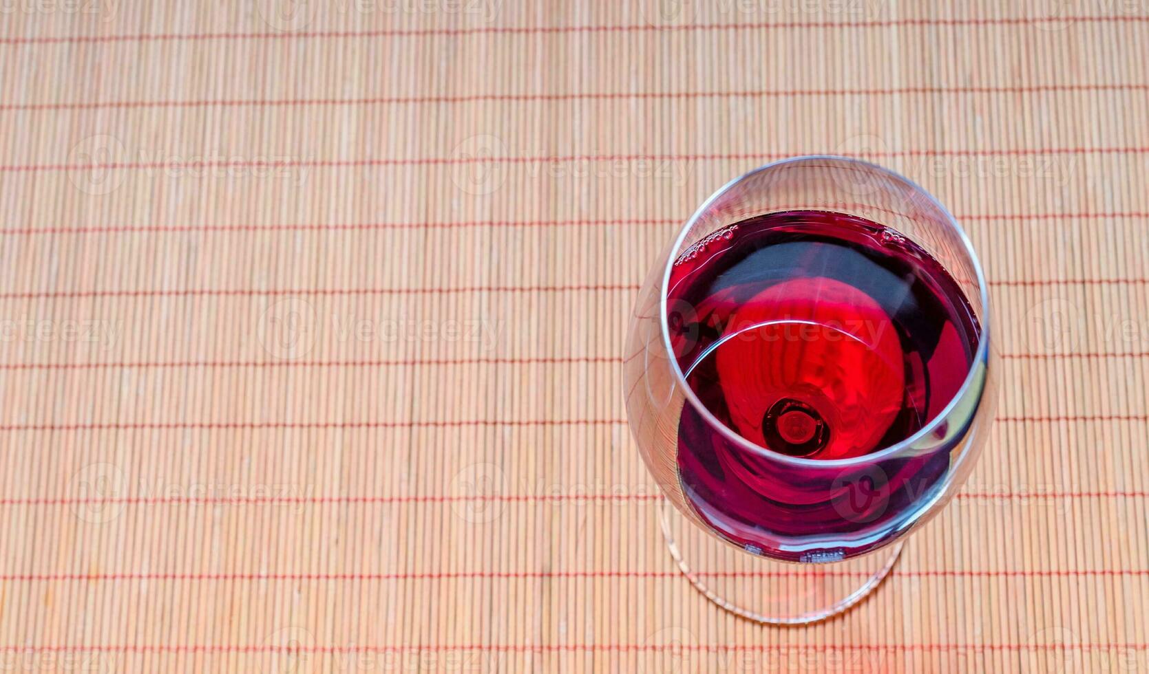 Red Wine In A Wine Glass. The Top View photo
