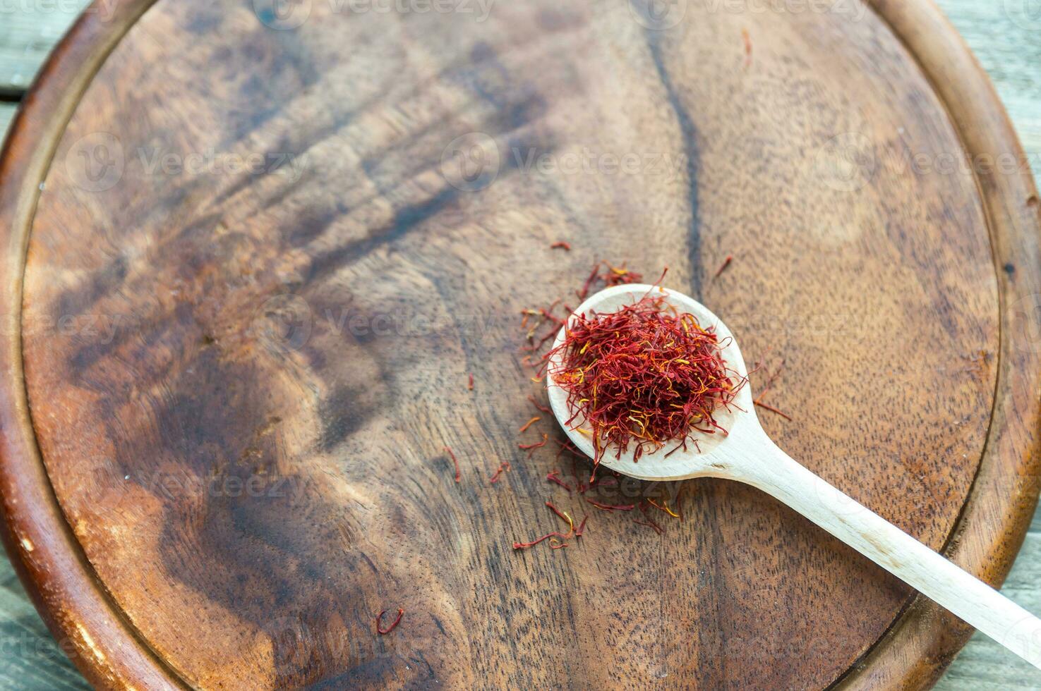 Saffron on the wooden spoon photo