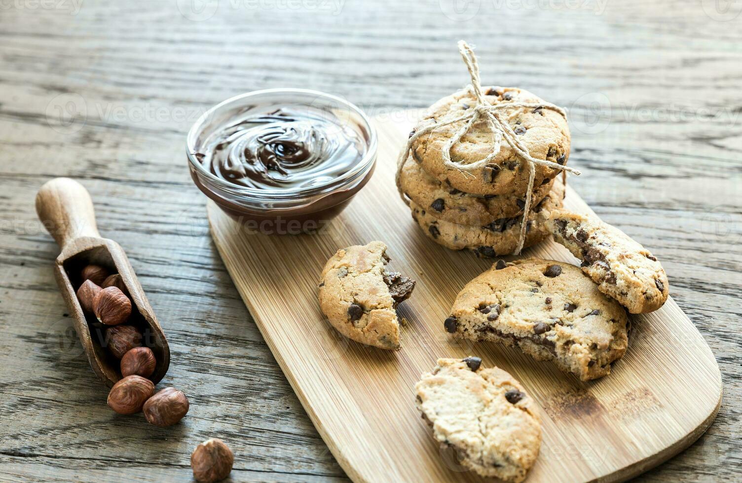 Cookies with chocolate cream and hazelnuts photo