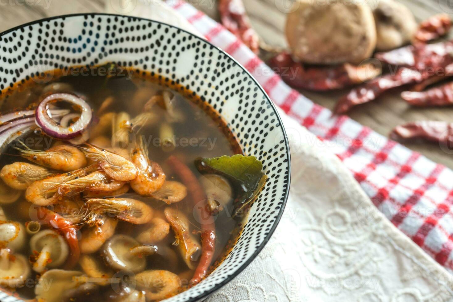 Bowl of thai tom yum soup photo