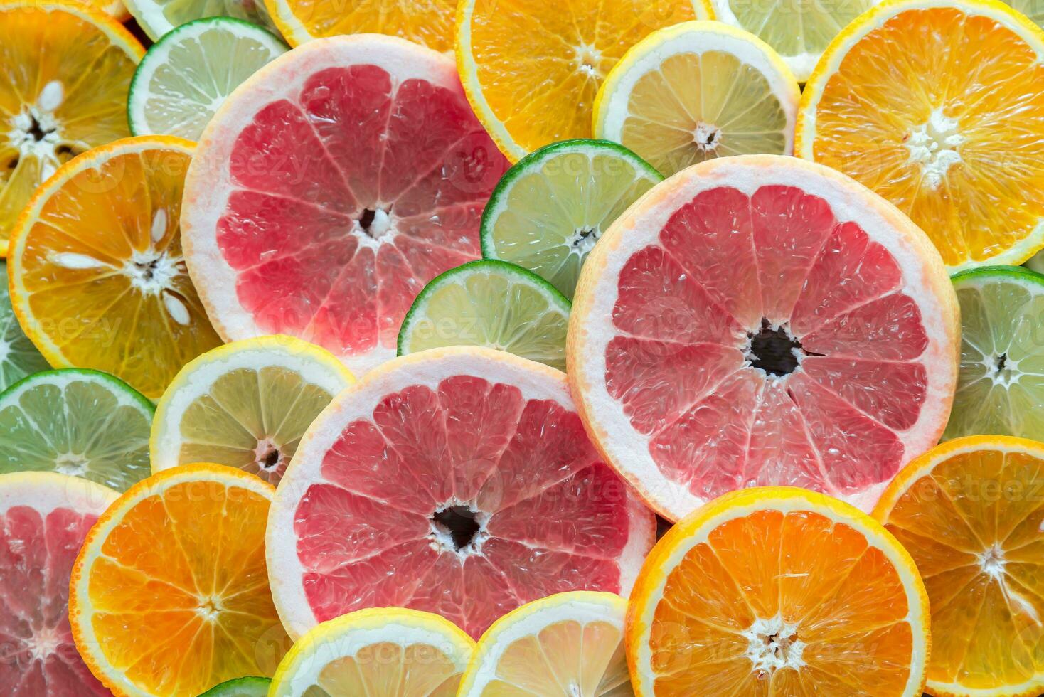 Slices of citrus fruits photo