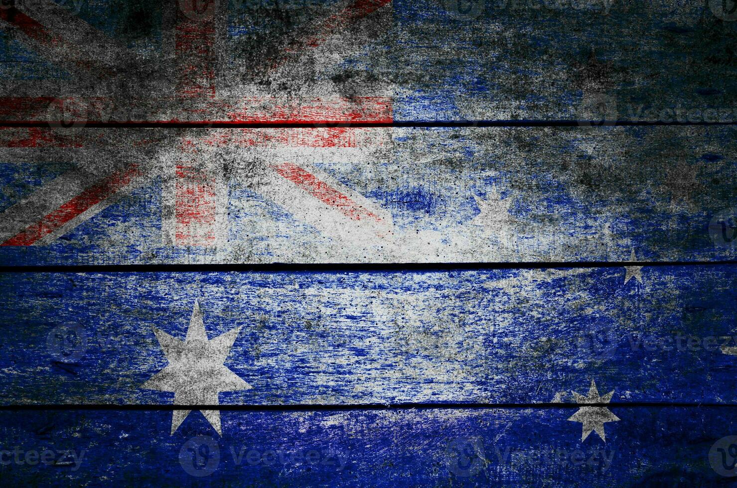 wooden texture surface with old painted flag photo