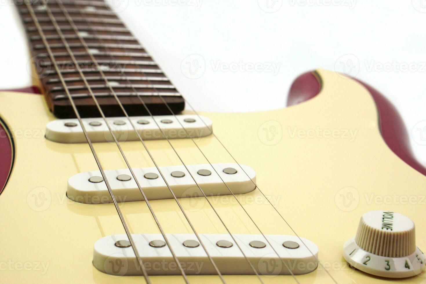 Selective focus, focus acoustic guitar strings on white background with copy space. Love, entertainment and music concept. photo