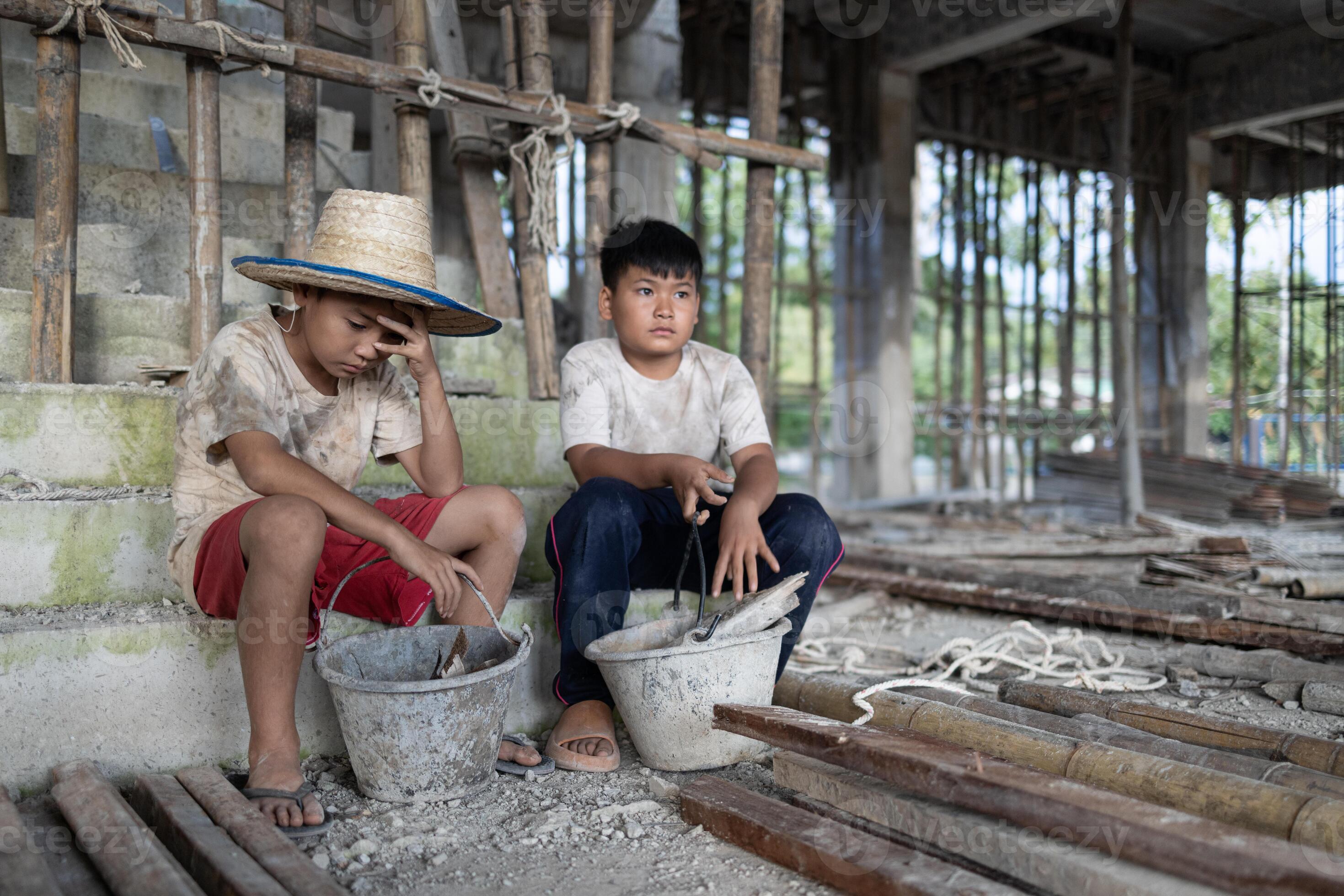 Concept of child labor, poor children being victims of construction