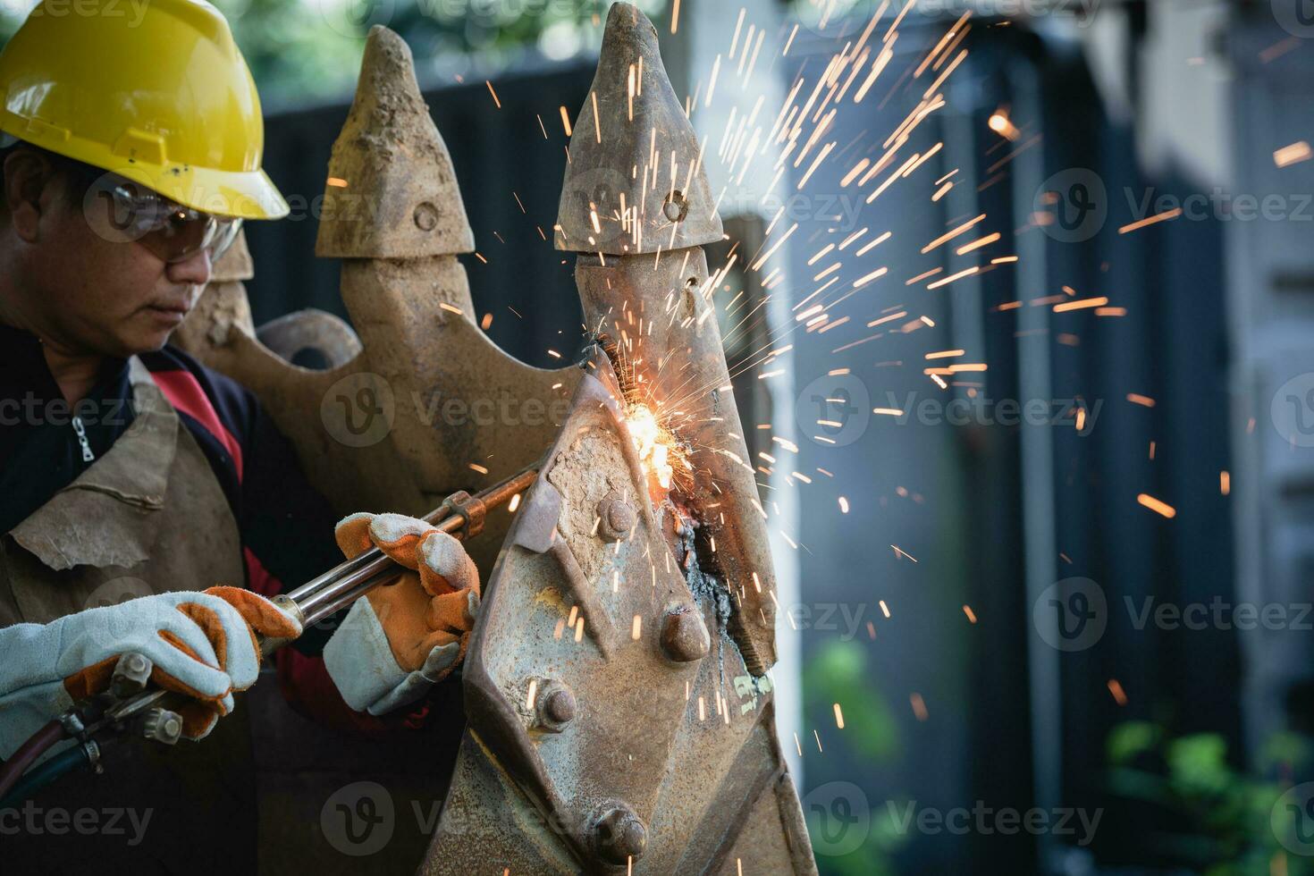 Cutting steel with gas,  gas welding  and oxy-fuel cutting are processes that use fuel gases and oxygen to weld and cut metals, respectively. photo