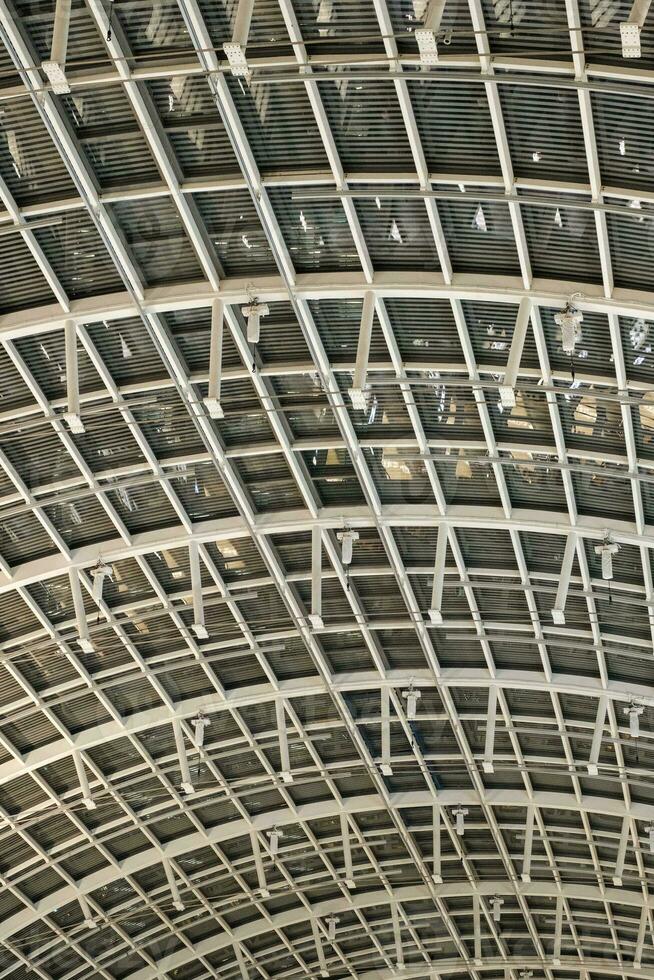 Singapore - June 24 2023. Symmetrical Roof Architectural Design Of The Shoppes photo