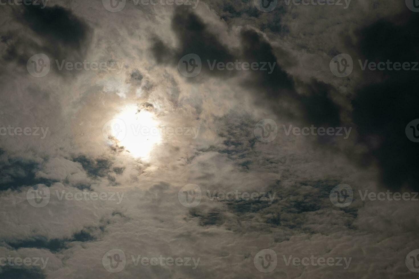 Bright Sun in Cloudy Skies photo