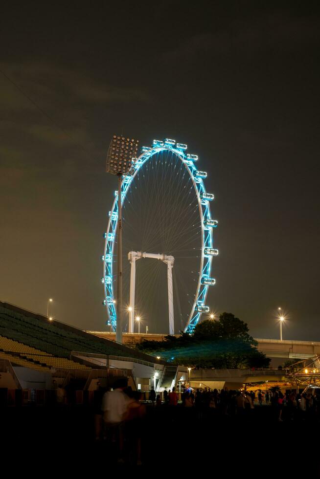 Singapore - June 24 2023. Singapore Flyer Obersavation Wheel Downtown Core District photo