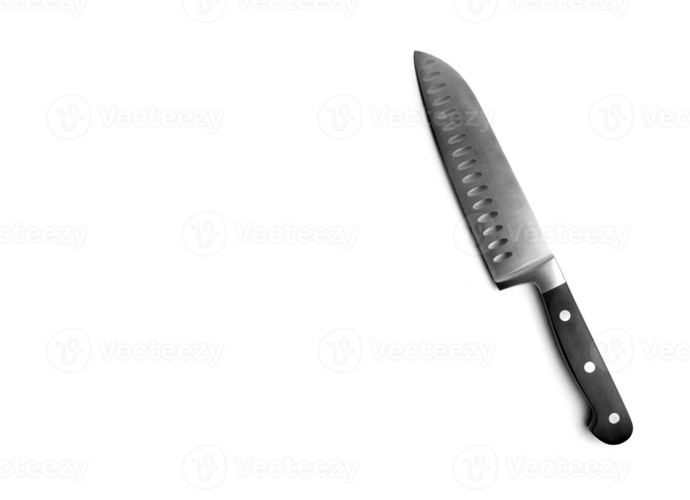 Black kitchen knife on the white photo