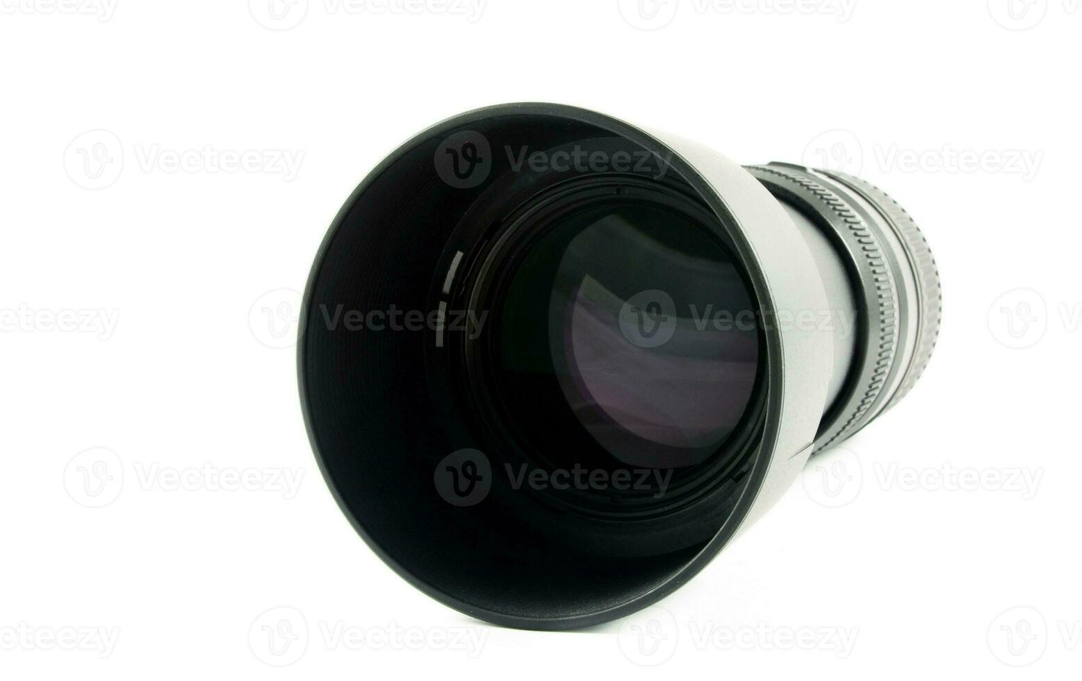 Black camera lens on white photo
