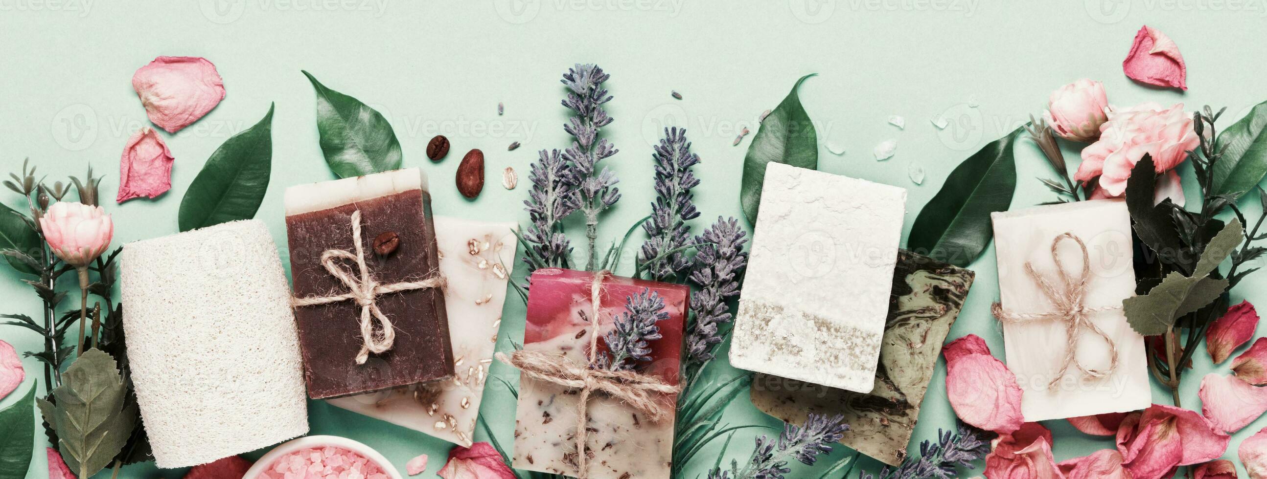 Banner with Natural soap bars and ingredients. Diy cosmetics products. Spa bath layout photo