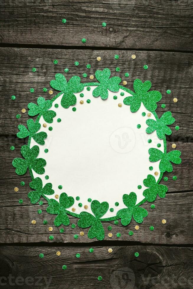 Happy St.Patricks Day shamrock and confetti frame. St. Patrick's Day postcard template photo