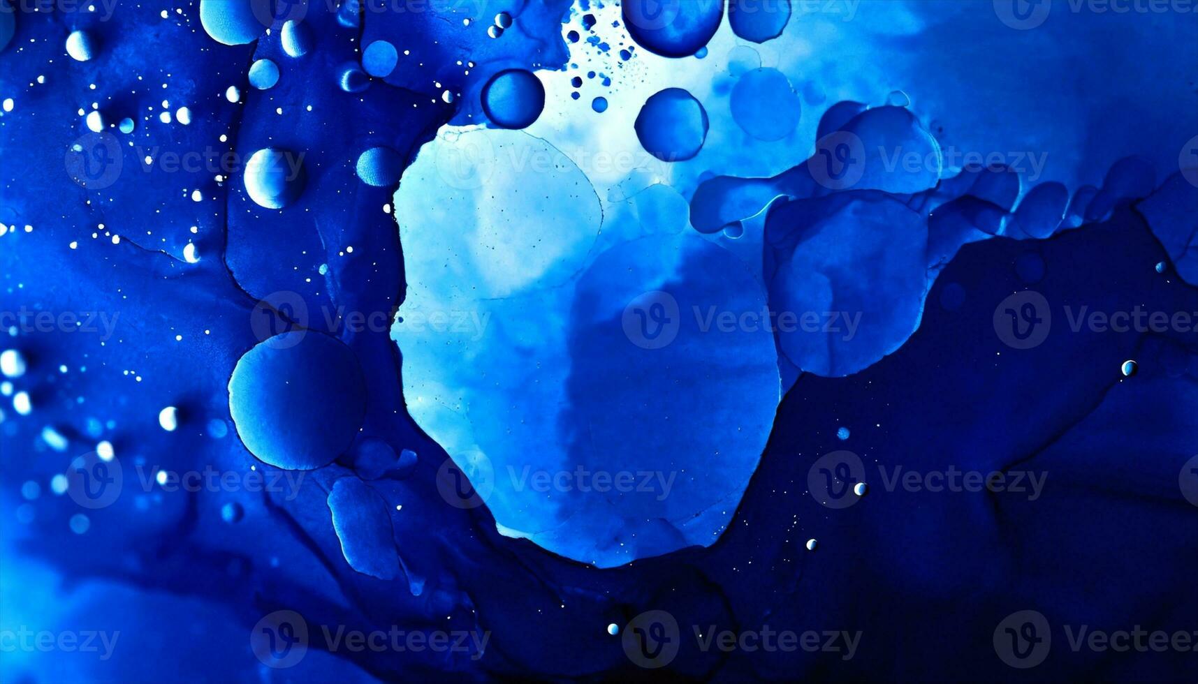 AI generated blue water drops on a black background photo