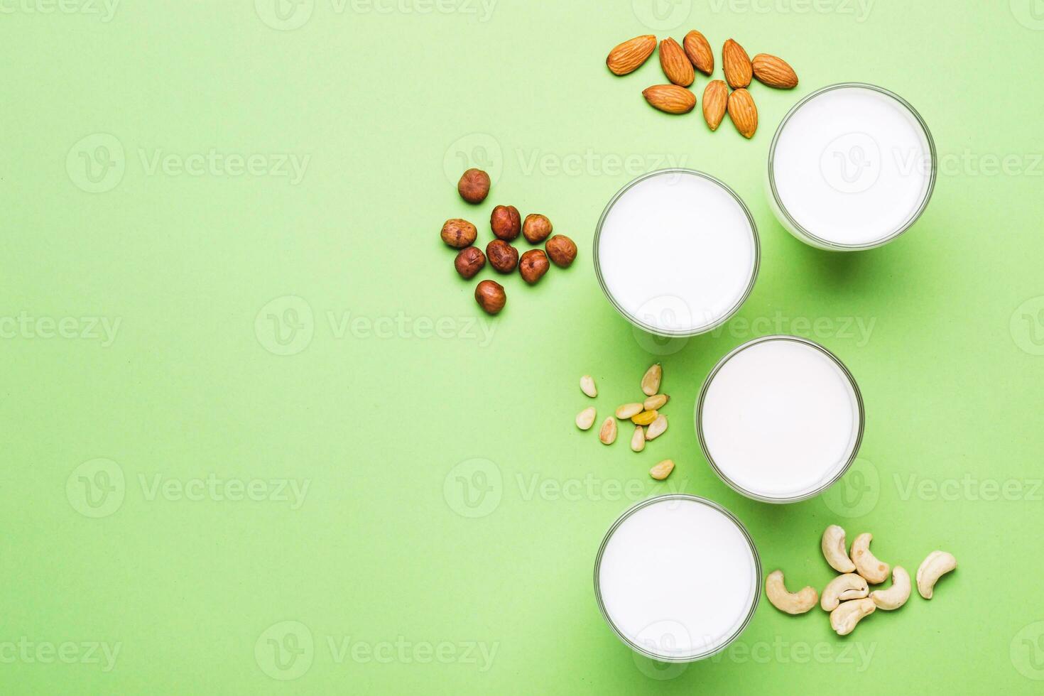 Nuts non diary milk in glasses . Health care, diet and nutrition concept photo