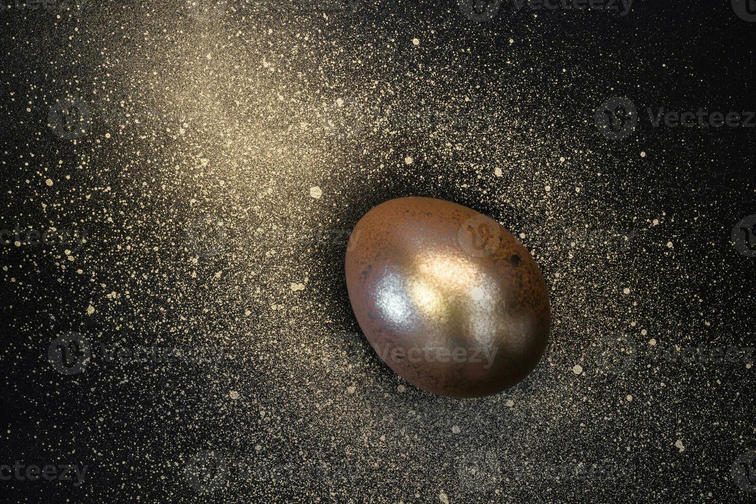 Golden egg and paint splashes on black background. Abstract cosmos. Happy easter minimal concept photo