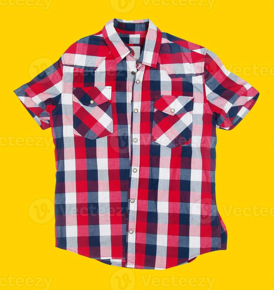 Button shirt on yellow background photo