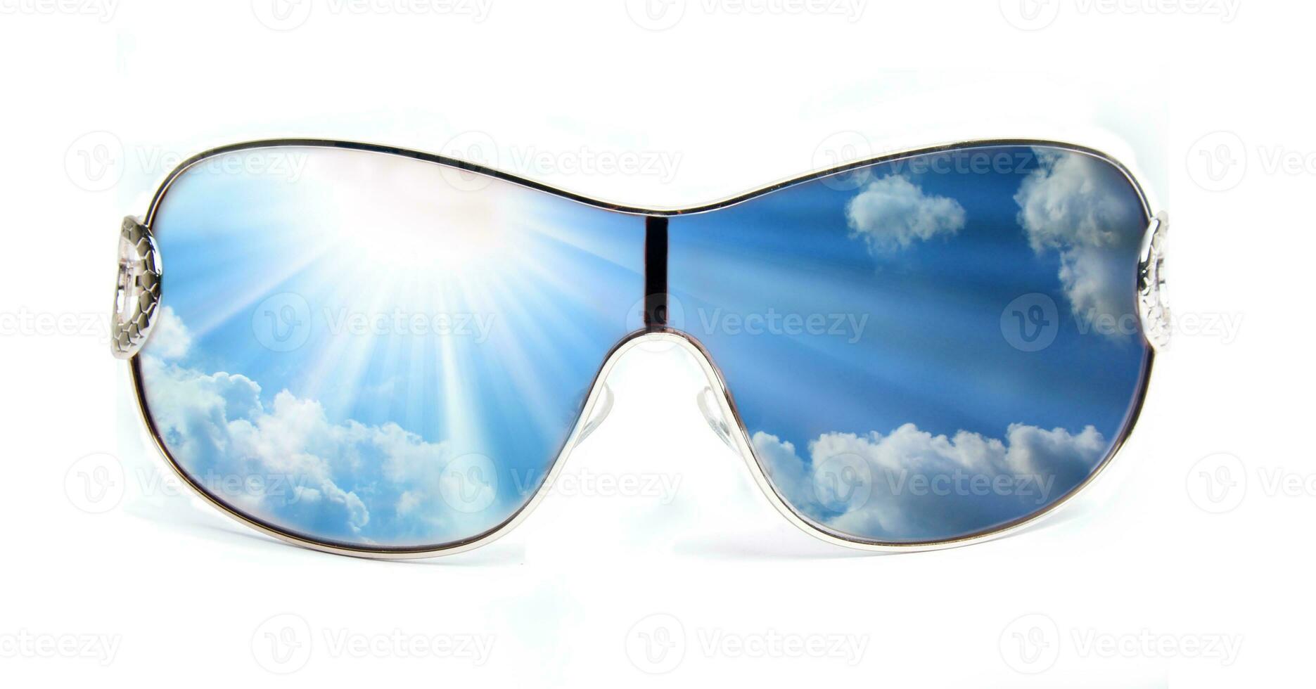 female sunglasses with sky photo