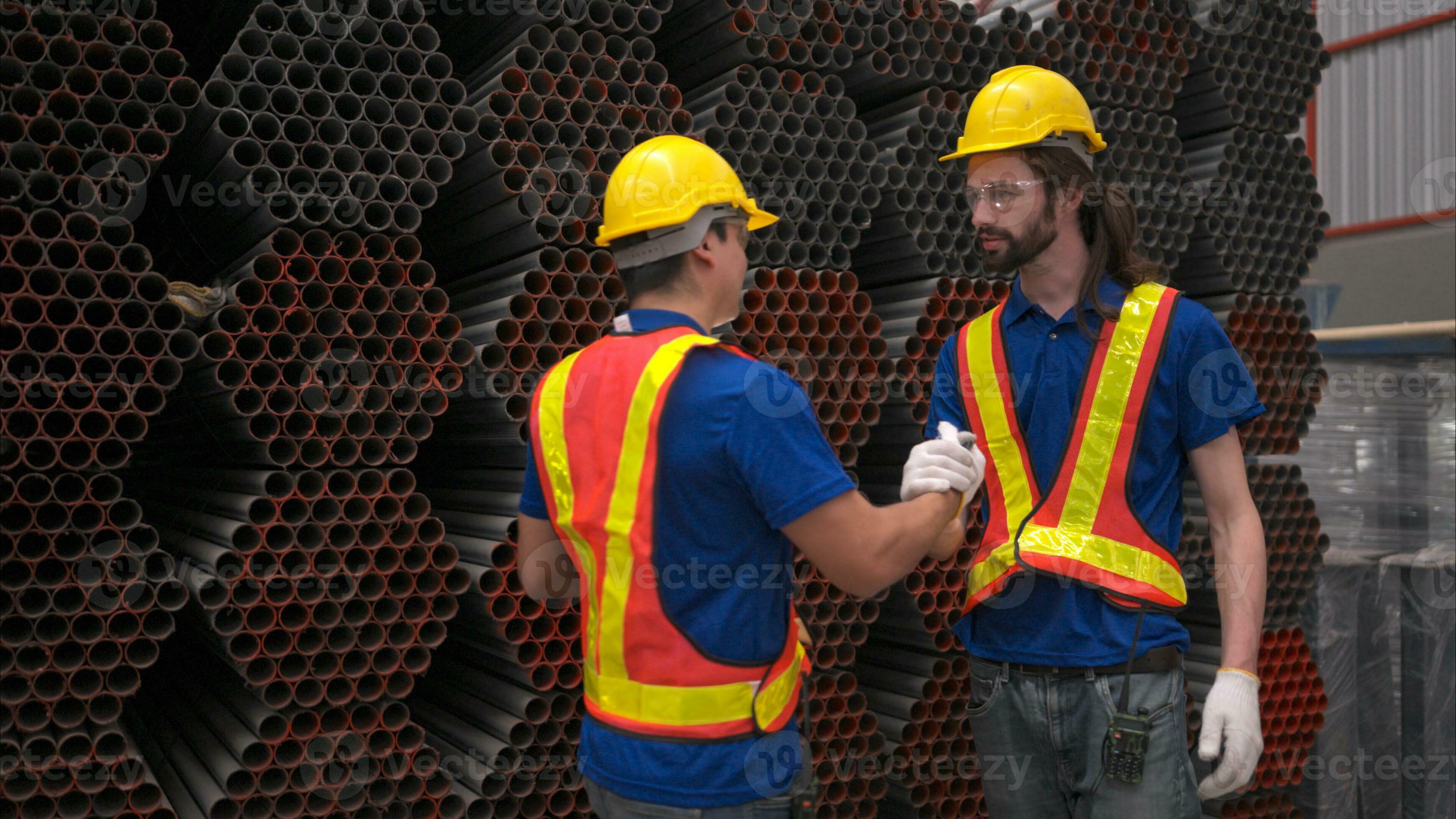 Warehouse workers in hard hats and helmets, Inspect and count steel in