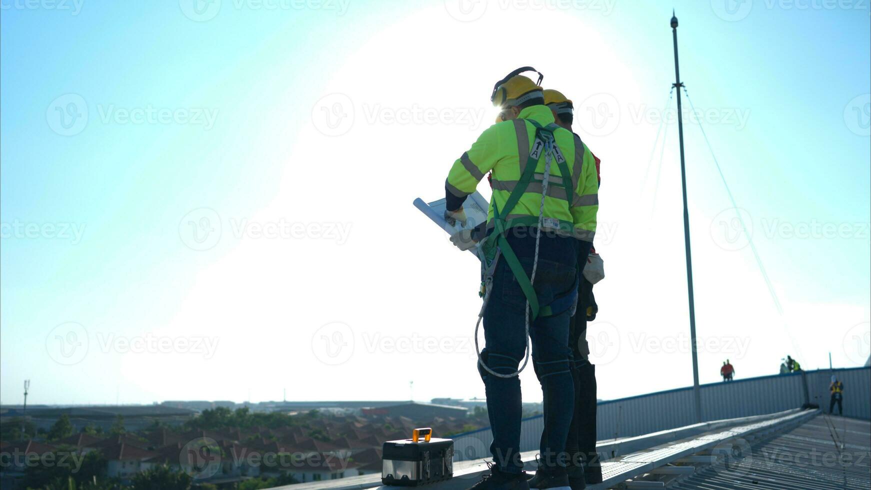 Both of technician working on a photovoltaic solar panels photo