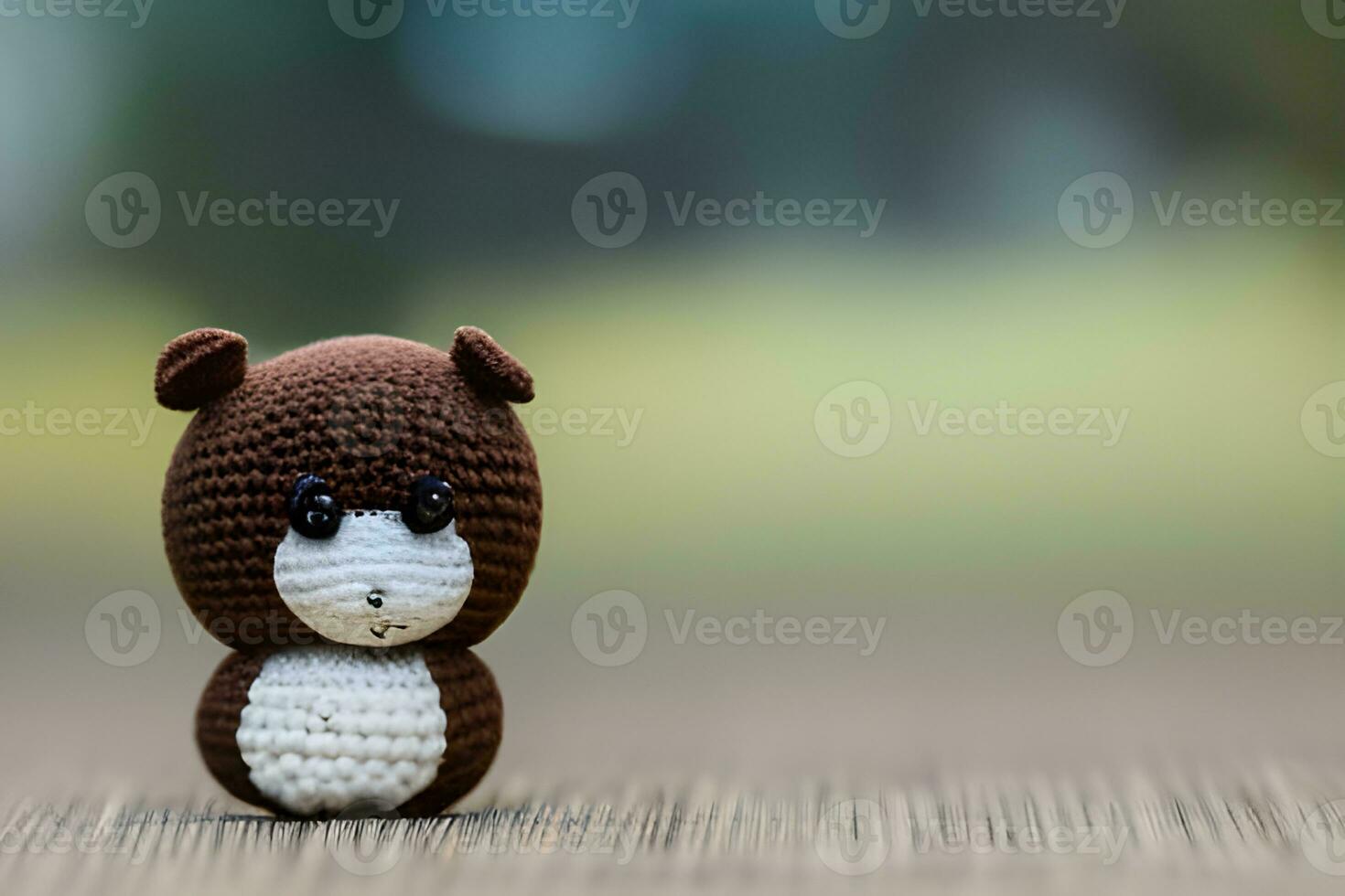 AI generated Crocheted Teddy Bear on Light Background photo
