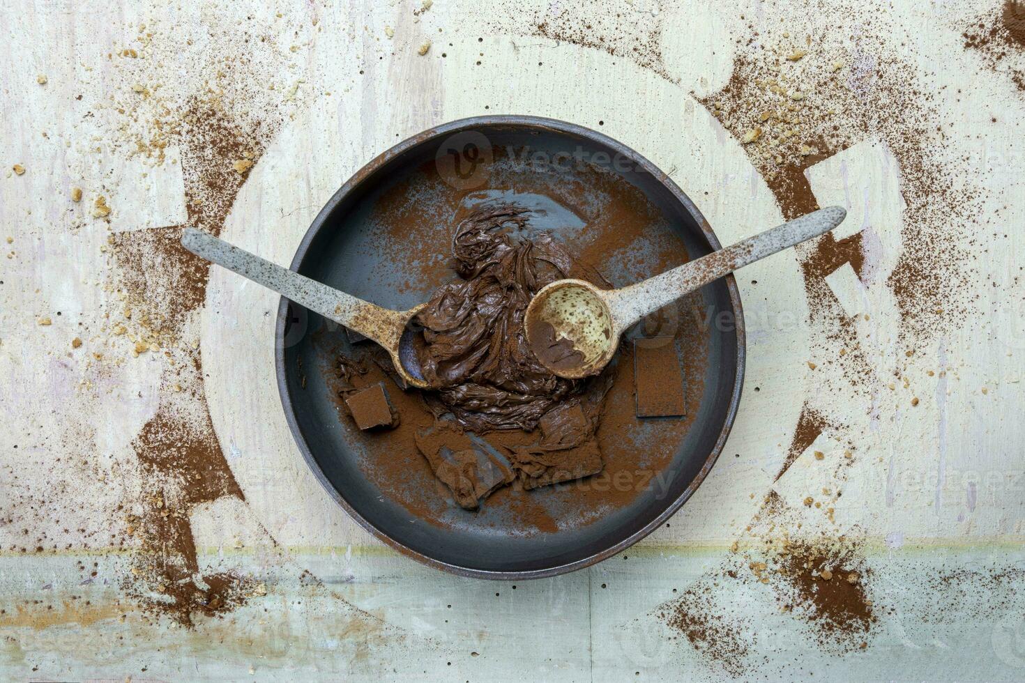 hazelnut cocoa cream and chocolate pieces mixed in a bowl photo