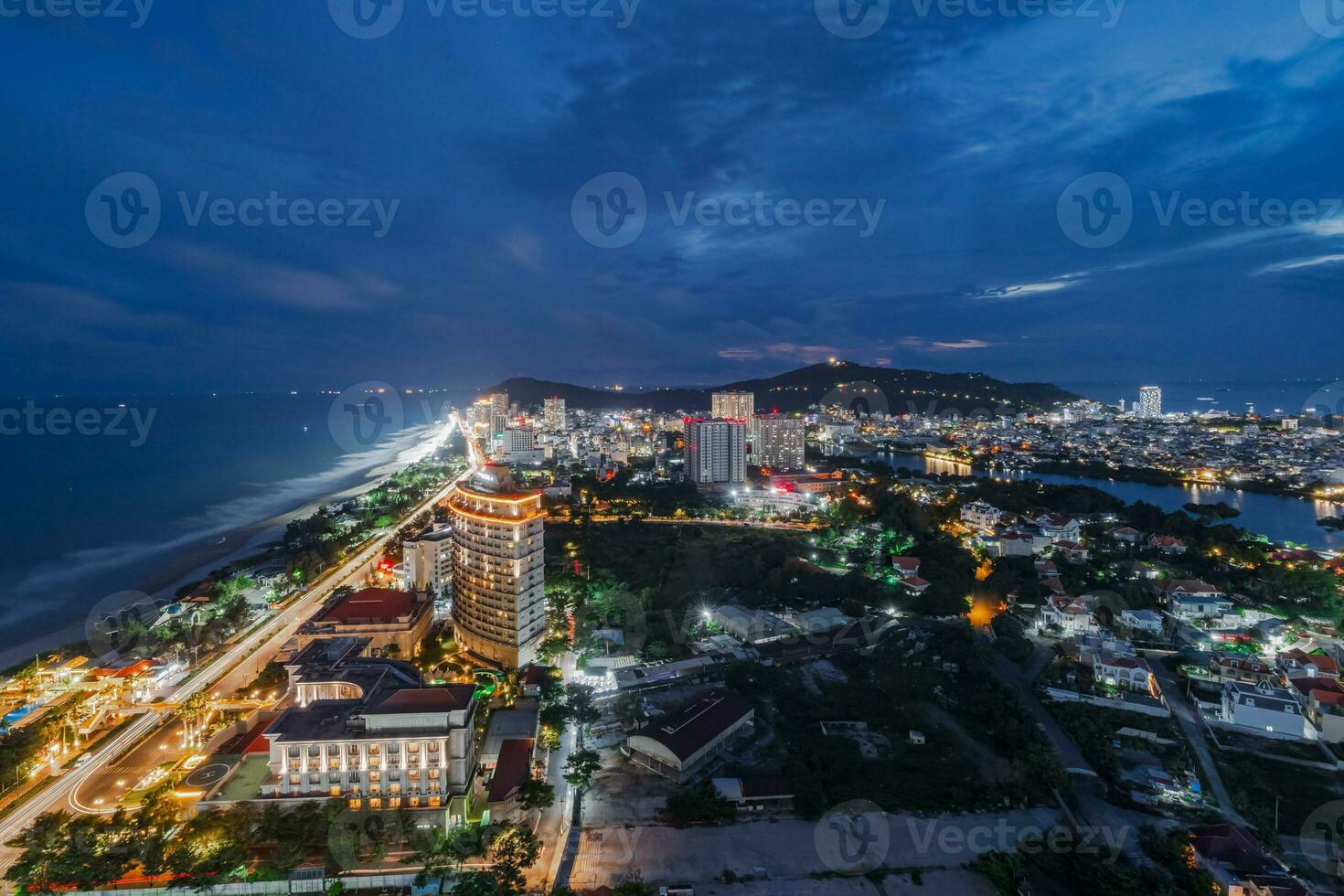 Night in Vung Tau city and coast, Vietnam. Vung Tau is a famous coastal city in the South of Vietnam photo