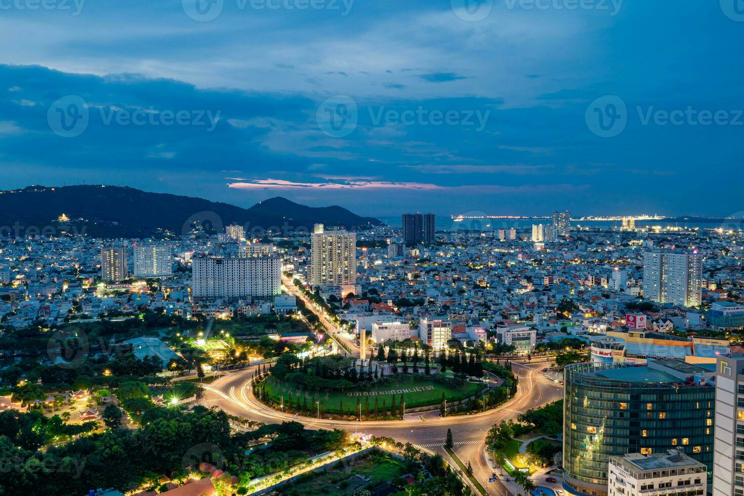 Sunset in Vung Tau city and coast, Vietnam. Vung Tau is a famous coastal city in the South of Vietnam photo